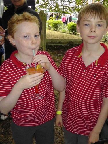 Kids drinking fruit cocktails
